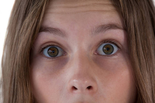 istock Girls eye and nose against white background 825766208
