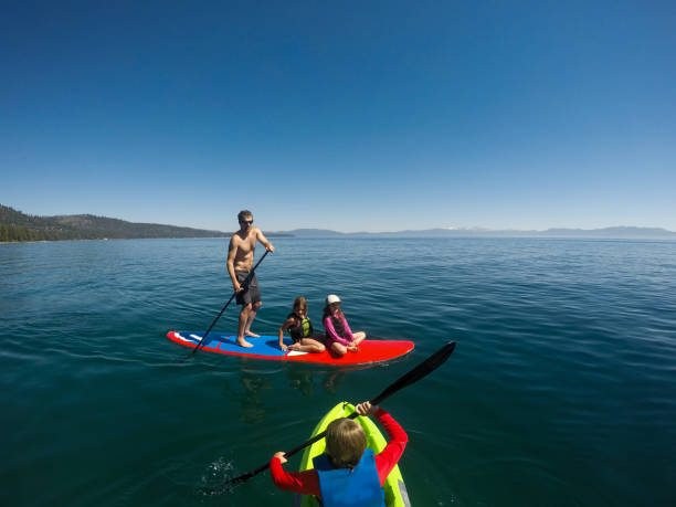 istock Father with children on lake Tahoe 825766546