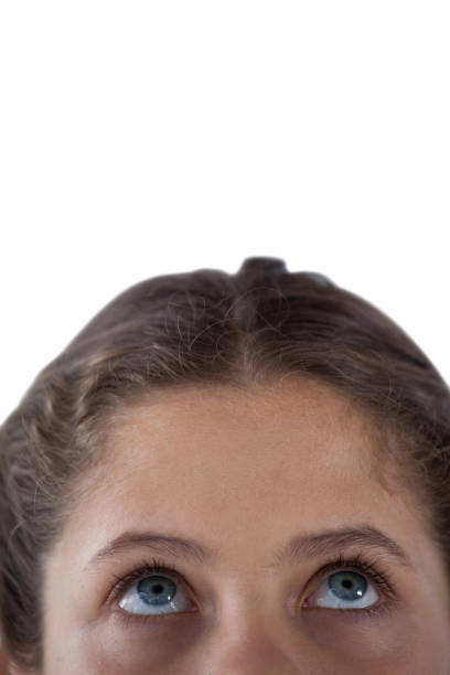 istock Girls eye and nose against white background 825773448