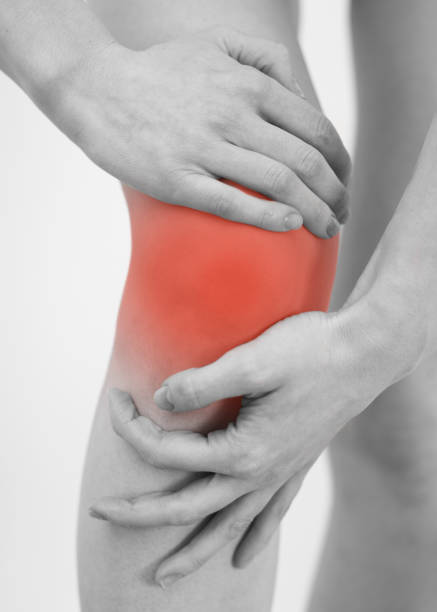 istock Woman having pain in her knee. 825777100