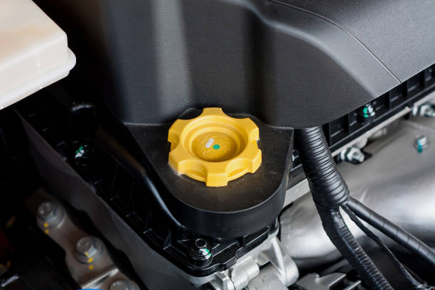 istock engine oil cap in car hood 825778170