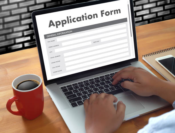 istock business man working on laptop computer use Online Web Job Application Form moniter 825781168