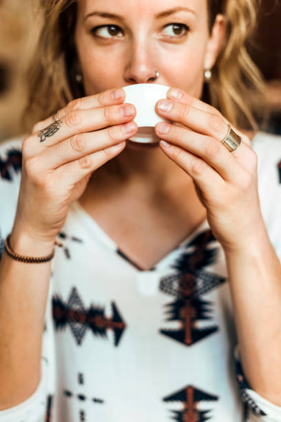 istock Young Woman Drinking Tea Concept 825785424