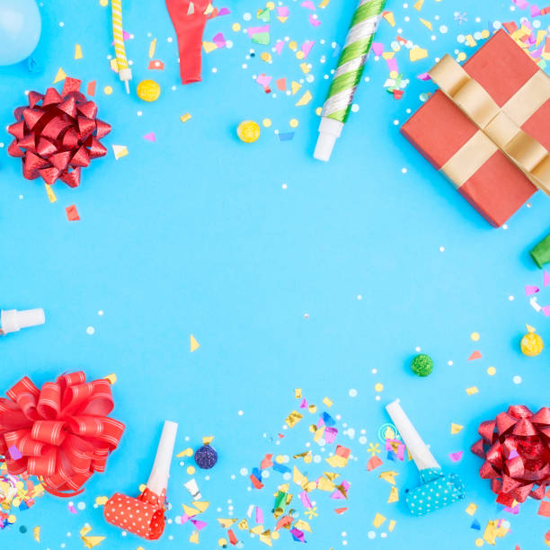istock Colorful celebration pattern with various party confetti, balloons, gift box on blue background 825785896