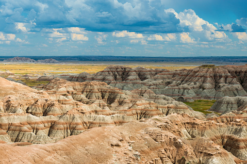 The Badlands from Pinnacles Overlook show eroded buttes with grassland (prairie) valleys. Badlands National Park, South Dakota, USA.
