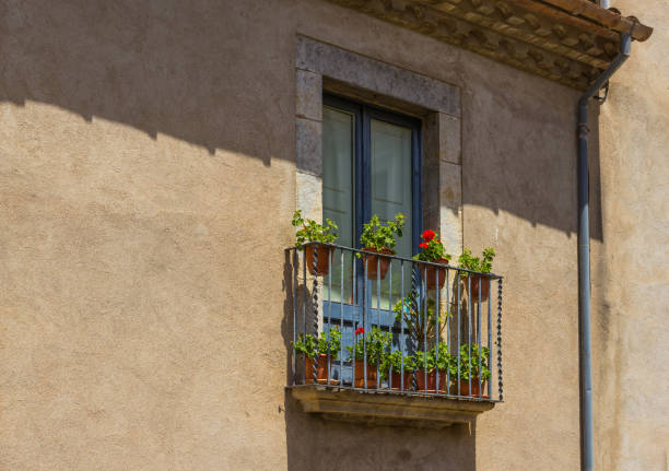Balcony with flowers in Girona, Spain