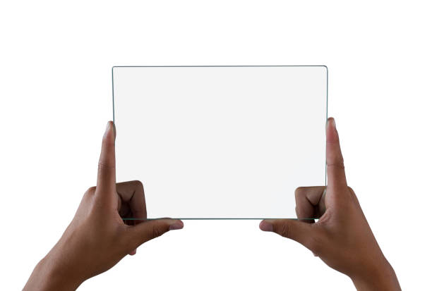 istock Teenage boy holding a glass digital tablet 825789340