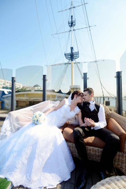 istock Wedding couple on the nature is hugging each other 825796532