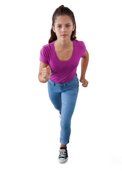 istock Girl running against white background 825796758