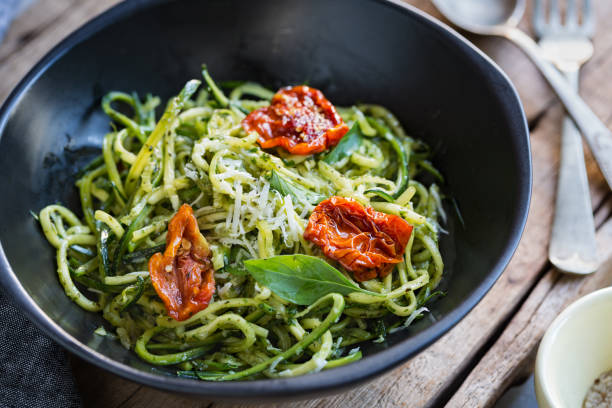 istock Zucchini Pasta in Pesto sauce with Sun dried Tomato 825799846