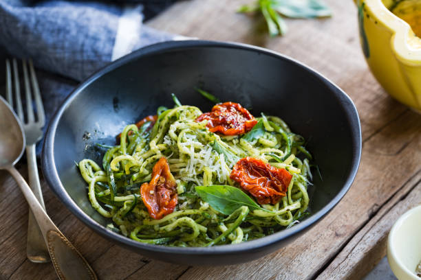 istock Zucchini Pasta in Pesto sauce with Sun dried Tomato 825800062