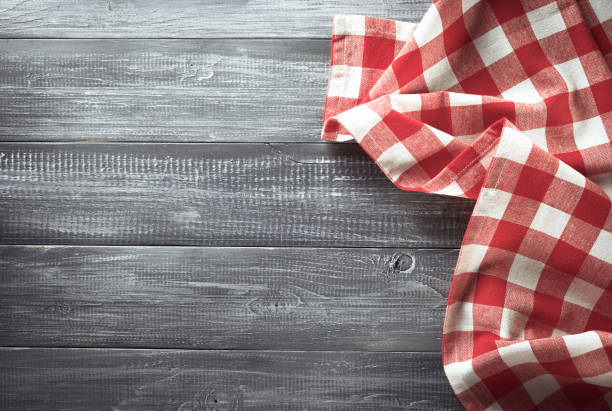istock cloth napkin checked on wood 825802630