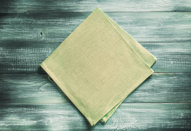 istock cloth napkin checked on wood 825802642