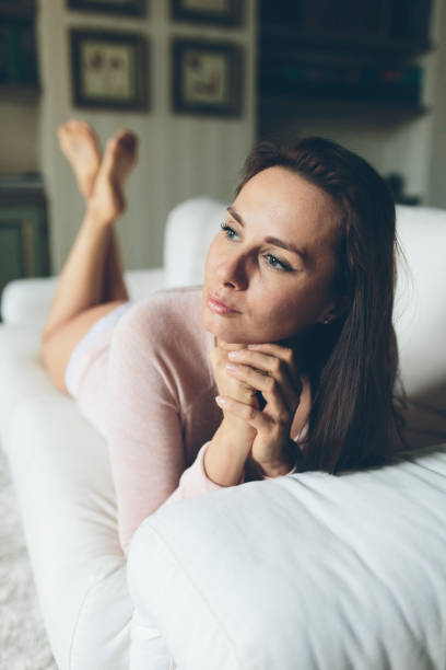 istock Woman checking the cell phone at home 825802662
