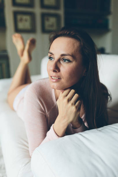 istock Woman checking the cell phone at home 825802734