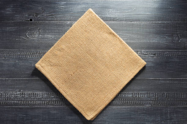 istock cloth napkin checked on wood 825802918