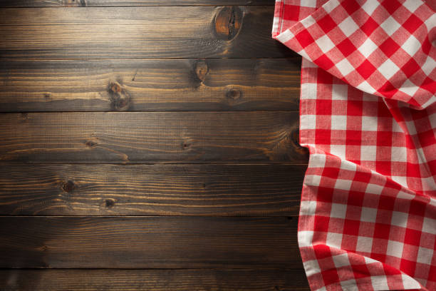 istock cloth napkin checked on wood 825803040