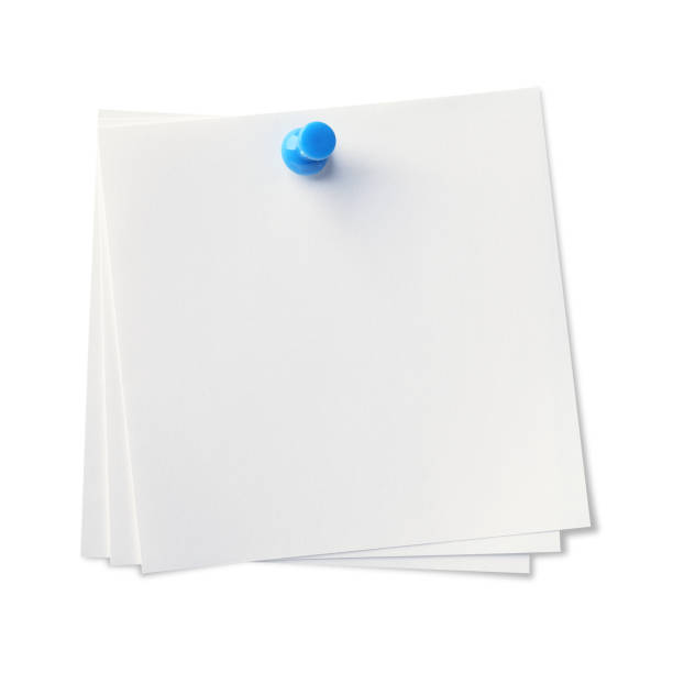 istock close up of a note paper with push pin on white background 825804342