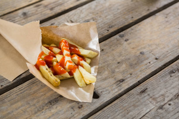 High angle view of French fries with sauce