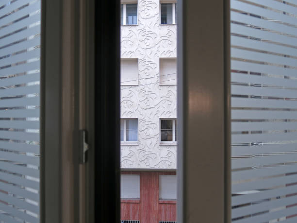 istock Looking through window a modern building in front of the office home business 825814704