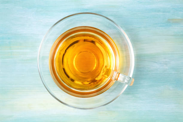 istock Cup of tea with copy space, overhead photo 825817738