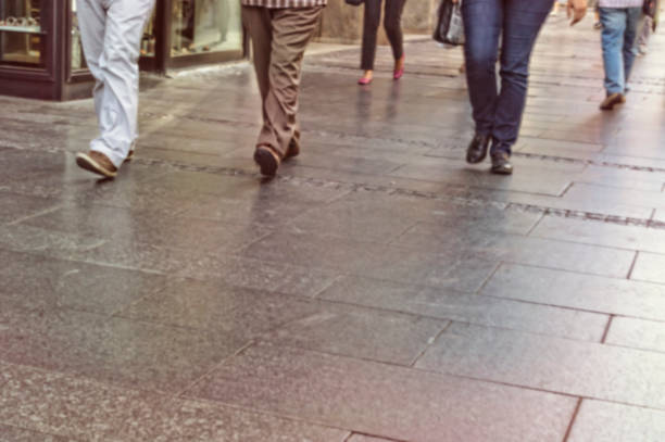 istock High blurred image of crowd people on street 825818322