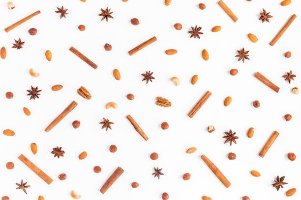 istock Pattern made of nuts, anise, cinnamon. Flat lay, top view 825818748