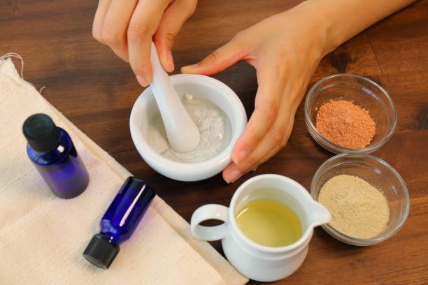istock A woman who kneads a clay pack 825818982