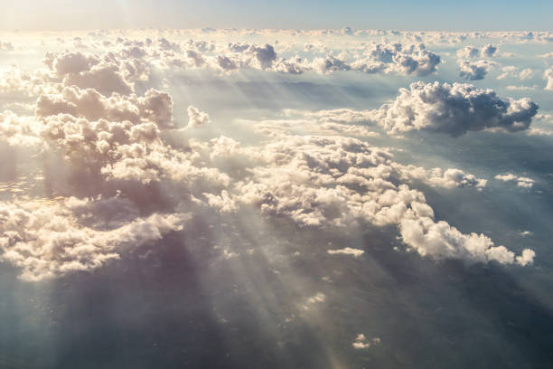 istock Blue sky and Clouds as seen through window of aircraft 825826206
