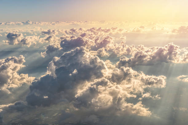 istock Blue sky and Clouds as seen through window of aircraft 825826278
