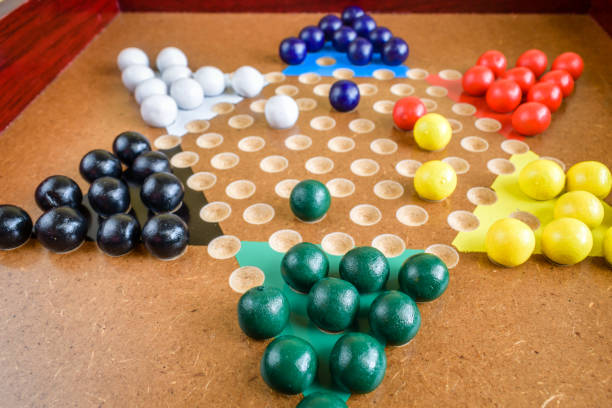 Closeup of Chinese Gameboard Concept photo of competition, strategy, winning, making a move and others. chinese checkers stock pictures, royalty-free photos & images