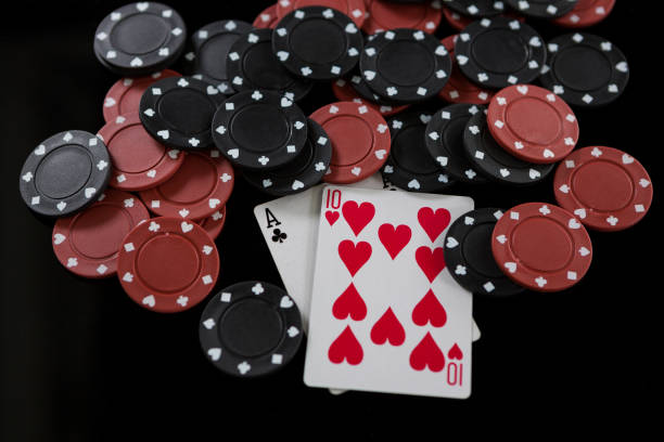 istock High angle view of cards and chips 825839826