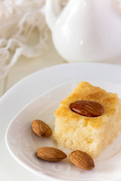 istock Piece Semolina cake Basbousa Traditional Arabic sweets 825842270
