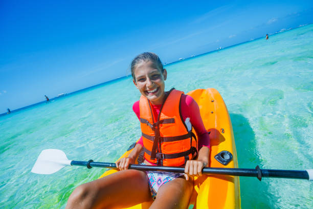 istock Beautiful Girl With Kayak Paddle 825845724