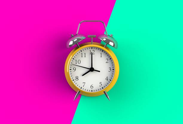 istock Alarm clock on pink and blue background, 3D rendering 825853510