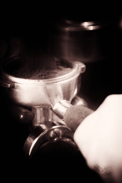 Closeup of espresso machine pouring coffee in cup, preparation and hot drinks concept