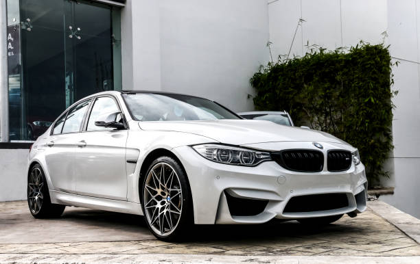 BMW M3 CANCUN, MEXICO - JUNE 4, 2017: Motor car BMW M3 (F80) in the city street. saloon car stock pictures, royalty-free photos & images