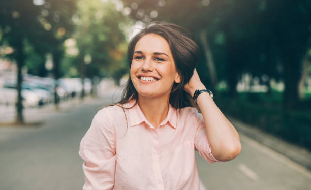 istock Happy woman in the city 825855426