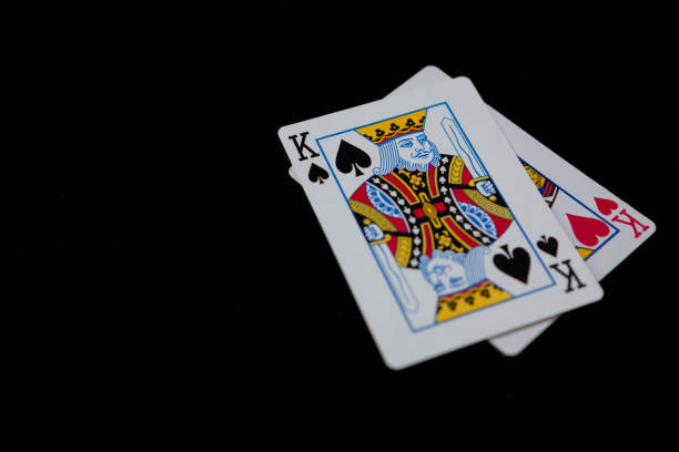 Close-up of king cards on black background