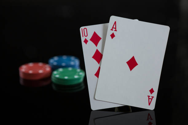 istock Close-up of diamond cards with chips 825861438