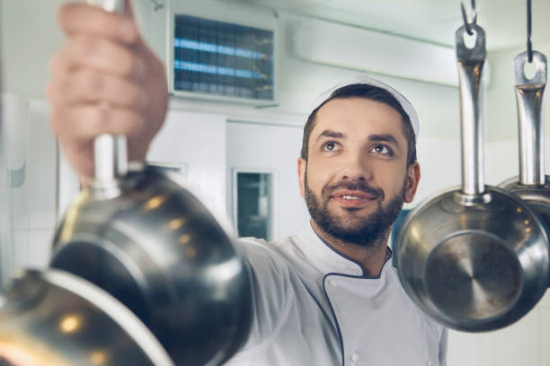 istock Man japanese restaurant chef working in the kitchen 825862940