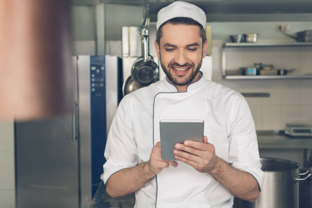 istock Man japanese restaurant chef working in the kitchen 825863046