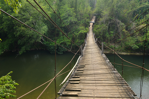 Suspension bridge over Mae Chan river at Mae Chan Tha Village, Tak