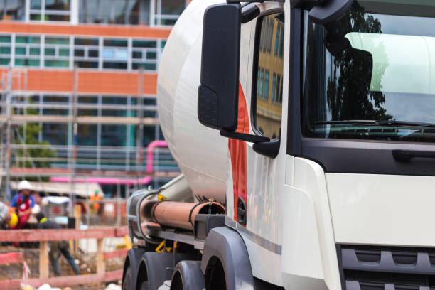 istock Concrete mixer truck on a construction site 825866378