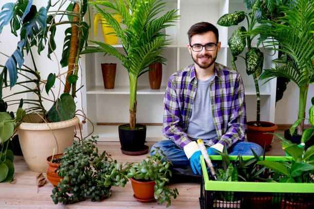 istock Male florist at shop 825866696