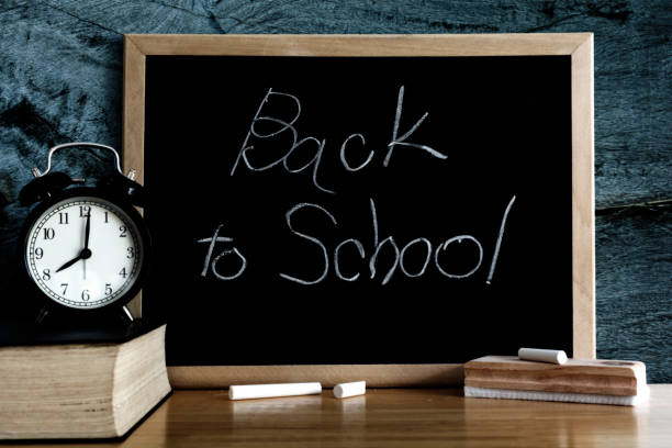 istock Chalkboard with wording Back to school and. Black board for display text or graphic design. Abstract background. Still life style. 825870352