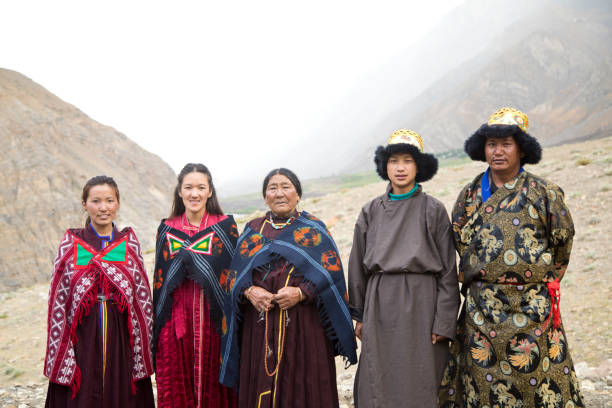istock Family posing in front of mountains 825887228