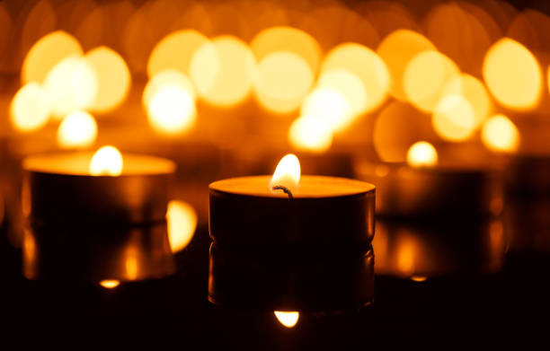 istock Burning candles with shallow depth of field 825887488