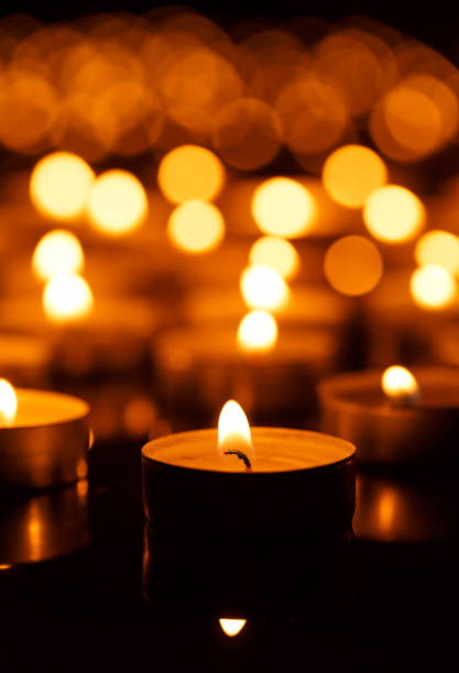 istock Burning candles with shallow depth of field 825888158