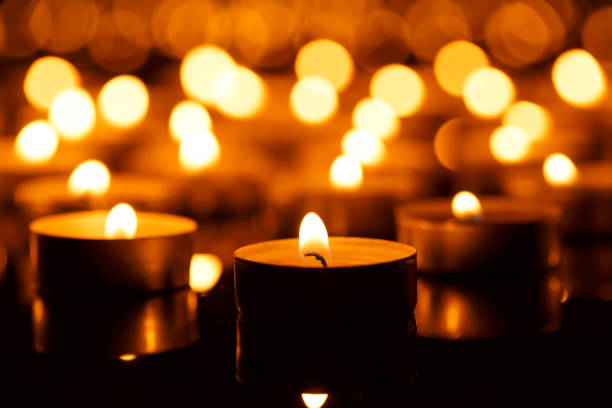 istock Burning candles with shallow depth of field 825890358